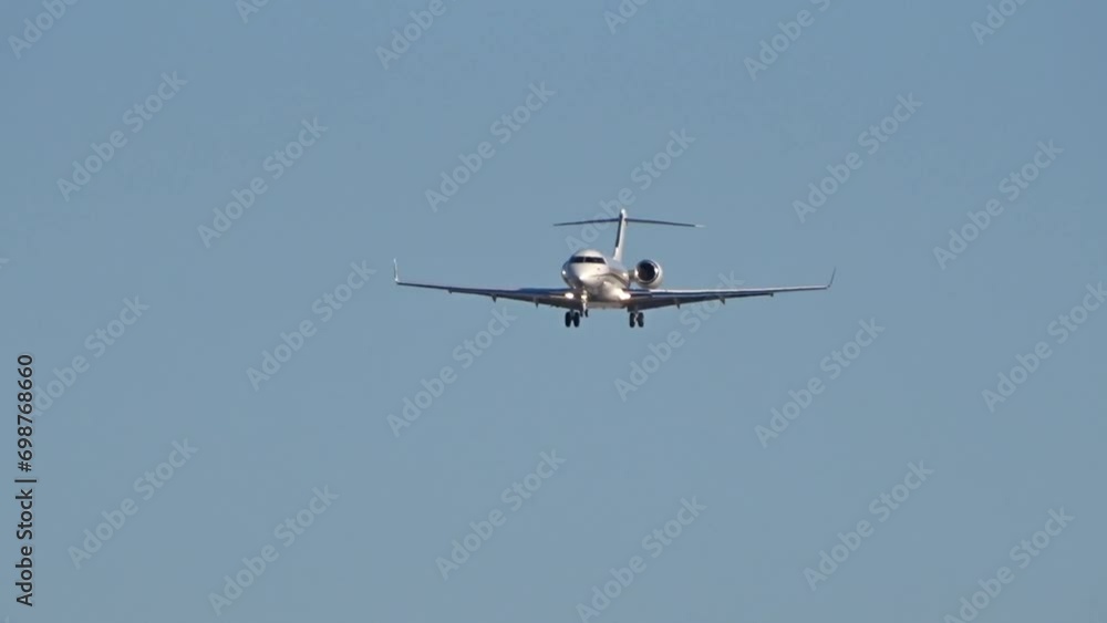 Big private jet on final approach for landing at international airport Big private jet on final approach for landing at international airport