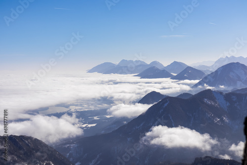 Wallpaper Mural Panoramic aerial view of snow capped mountain ranges of Karawanks, Julian and Kamnik Savinja Alps in Carinthia, Austria. Winter wonderland in remote Austrian Alps. Valley covered with mystical fog Torontodigital.ca