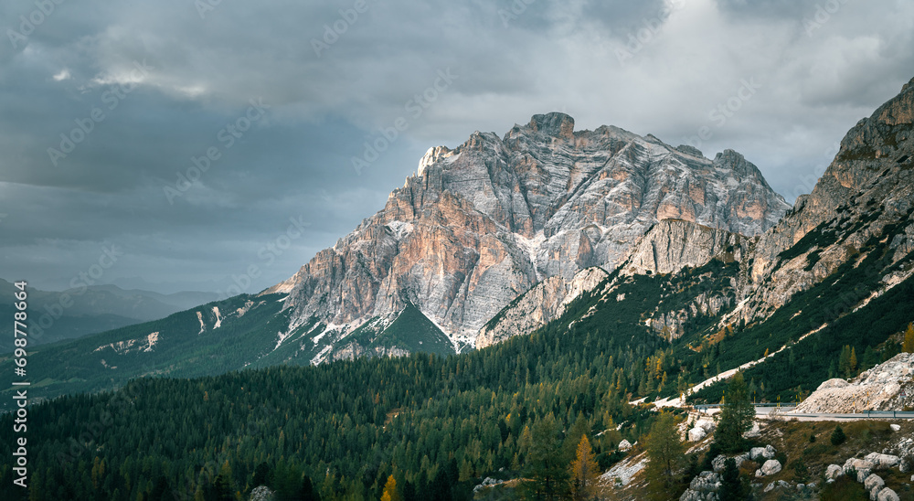 Stunning Italian Dolomites in vibrant colors. Picturesque Alpine mountain range at summer time.