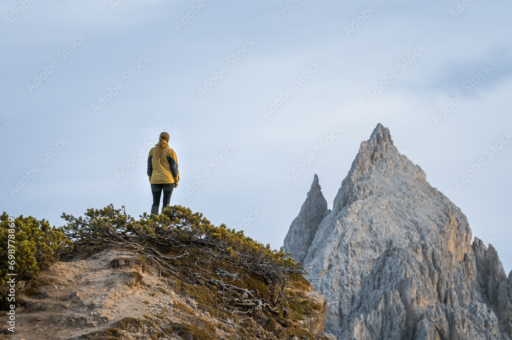 Stunning sunset with colorful sky at Italian Dolomites. Impressive Cadini di Misurina mountain range in autumn colors.