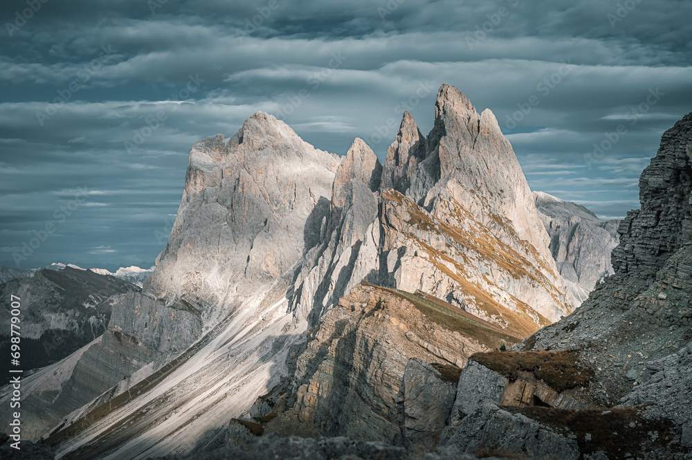 Stunning Italian Dolomites in vibrant colors. Picturesque Alpine mountain range at summer time.