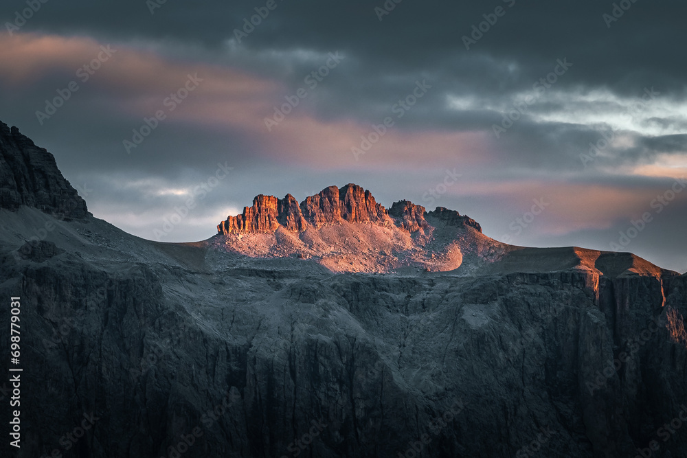 Stunning Italian Dolomites in vibrant colors. Picturesque Alpine mountain range at summer time.