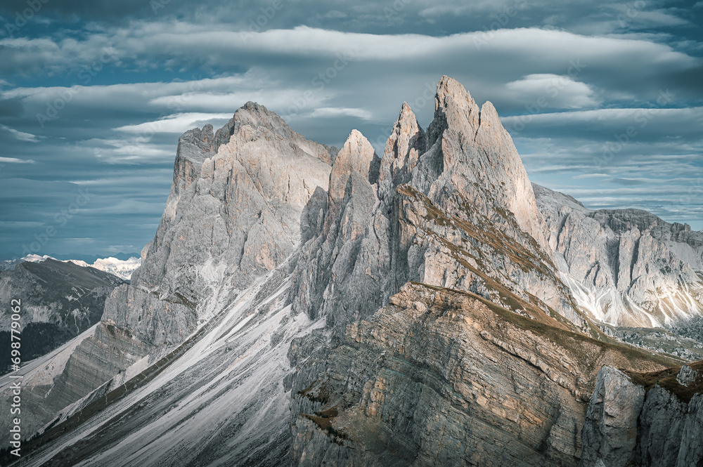 Stunning Italian Dolomites in vibrant colors. Picturesque Alpine mountain range at summer time.