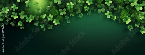 Green st patrick's day background with clovers copy space photo