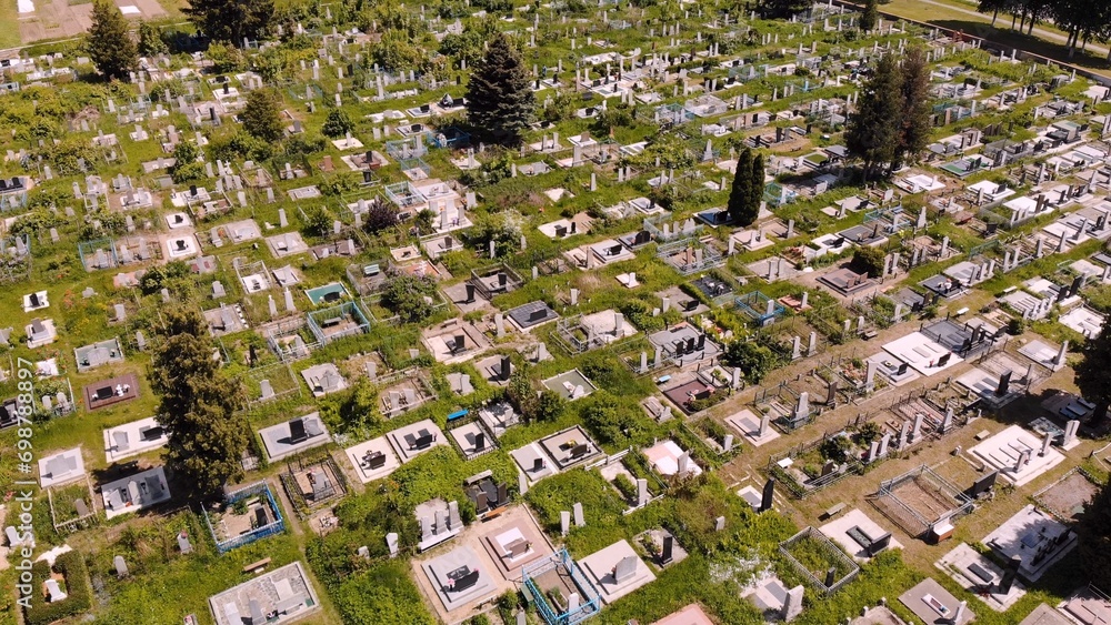 Fototapeta premium City cemetery. View from a drone in summer.