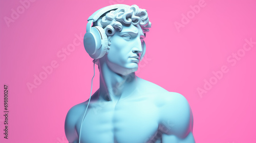 Handsome ancient Greek. Naked marble statue wearing headphones. Minimal surreal concept of festival, listening to music, rhythm, beat and historical fiction. Pink pastel background with copy space.