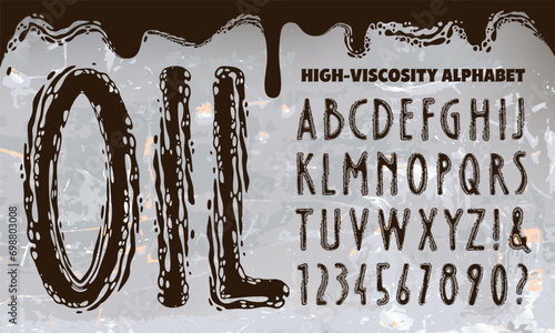 An alphabet made from smeared viscous black oil.