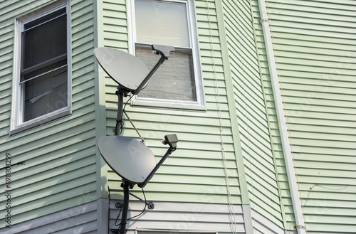 High-tech satellite dish against sky, symbolizing global communication and data transmission