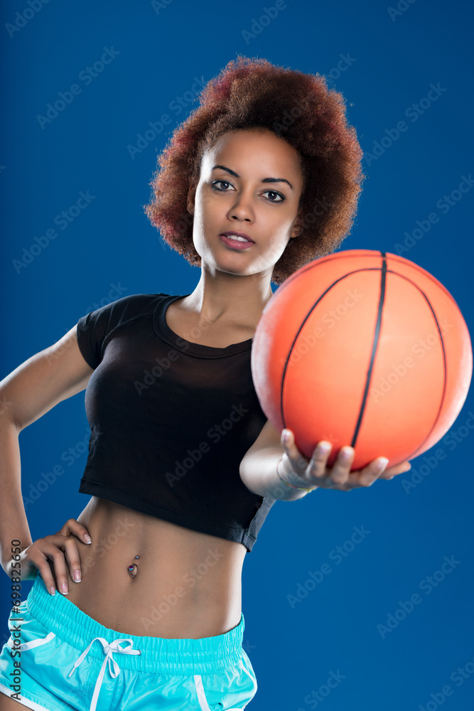 Determined athlete poised with sports gear