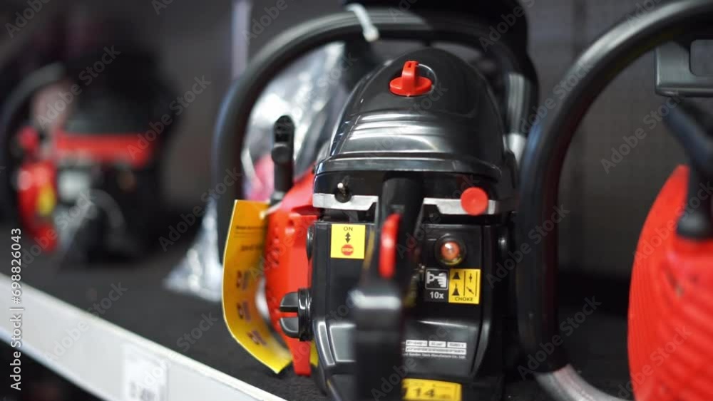 gasoline saw in a store. High quality FullHD footage gasoline saw in a store. High quality FullHD footage