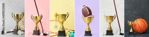 Collection of trophy cups with sports equipment on color background photo