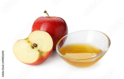 Delicious apples and bowl of honey isolated on white