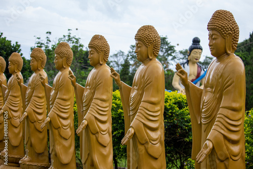 Vista parcial de 108 estátuas representando o Buda. Templo budista Chen Tien. Foz do Iguaçu, Paraná. Brasil. photo