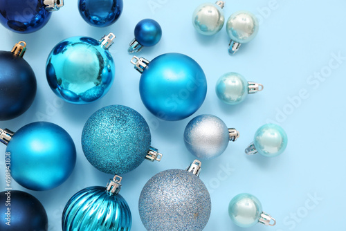 Composition with Christmas balls on blue background