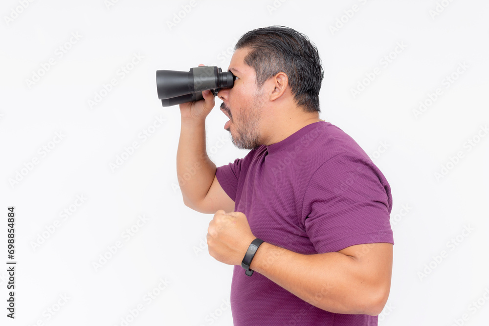 Side view of a man startled upon seeing something shocking with his binoculars. Wearing a purple waffle shirt, isolated on a white background. Side view of a man startled upon seeing something shocking with his binoculars. Wearing a purple waffle shirt, isolated on a white background.
