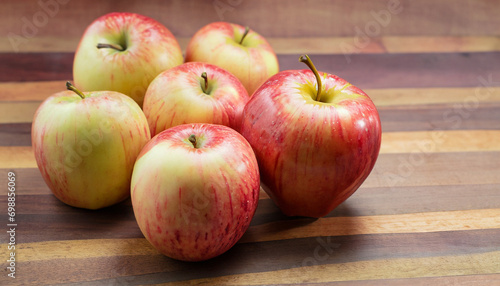 Group of Gala Apple on wooden board background, Fruits concept.