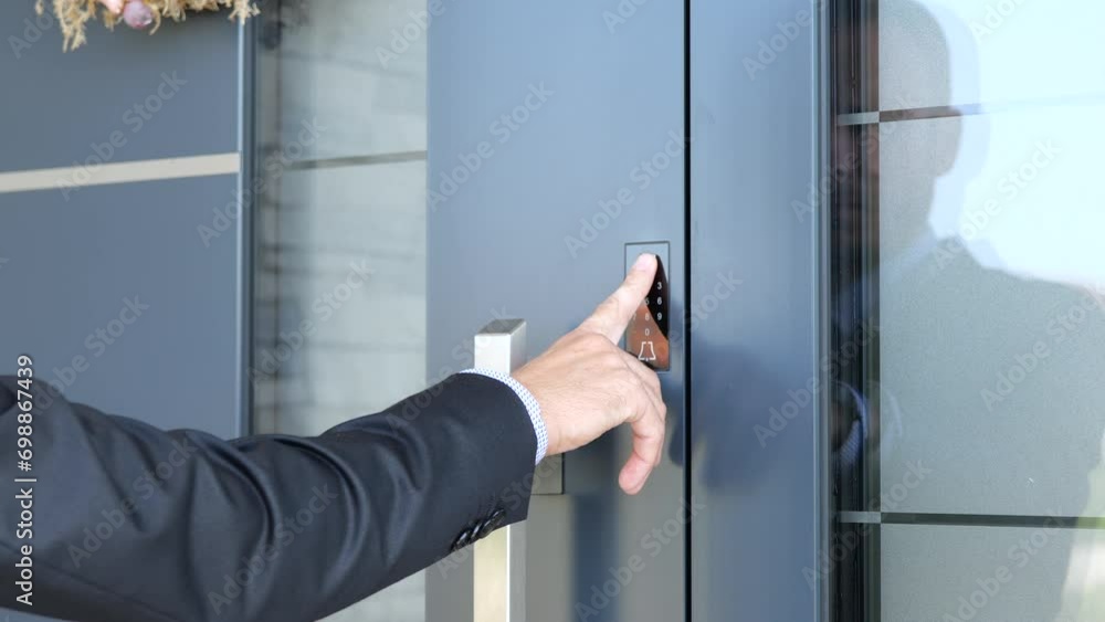 Man Scanning Fingerprint To Open The Door Of Smart Home. - close up shot Man Scanning Fingerprint To Open The Door Of Smart Home. - close up shot