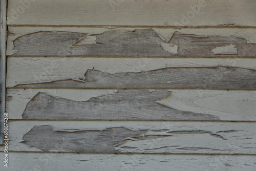 Tableau sur toile Peeling paint on side of old house