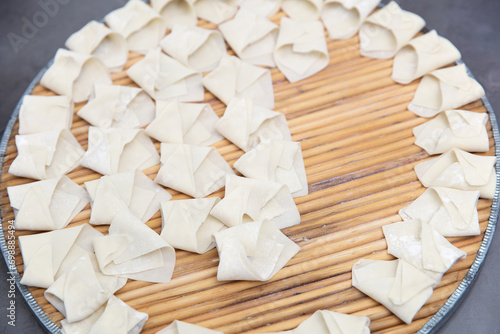 Ravioli arranged neatly on a tray