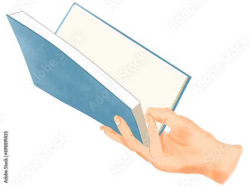 本（ノートまたは手帳）を持つ手