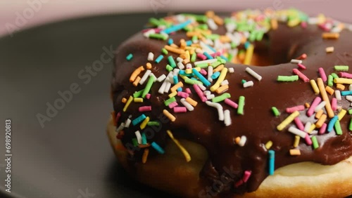 chocolate donut with sprinkles photo