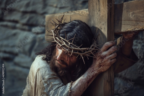 Jesus Christ wearing a crown of thorns carries his cross, Good Friday