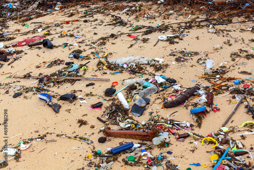 Garbage on sea beach, dirty ocean water, environmental pollution, ecological problem, waste management, junk recycle, unsorted rubbish, plastic bag, glass bottle, metal can, trash, refuse pile, litter Garbage on sea beach, dirty ocean water, environmental pollution, ecological problem, waste management, junk recycle, unsorted rubbish, plastic bag, glass bottle, metal can, trash, refuse pile, litter