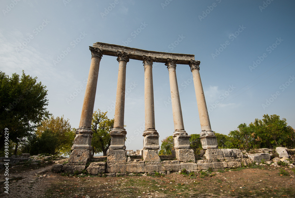 Fototapeta premium The ancient city of Uzuncaburc ( Turkish; Uzuncaburç ) Ancient Olsa Kingdom settlement. Near the north of Silifke district, Mersin, Turkey 