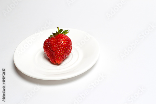 Red strawberry on white background