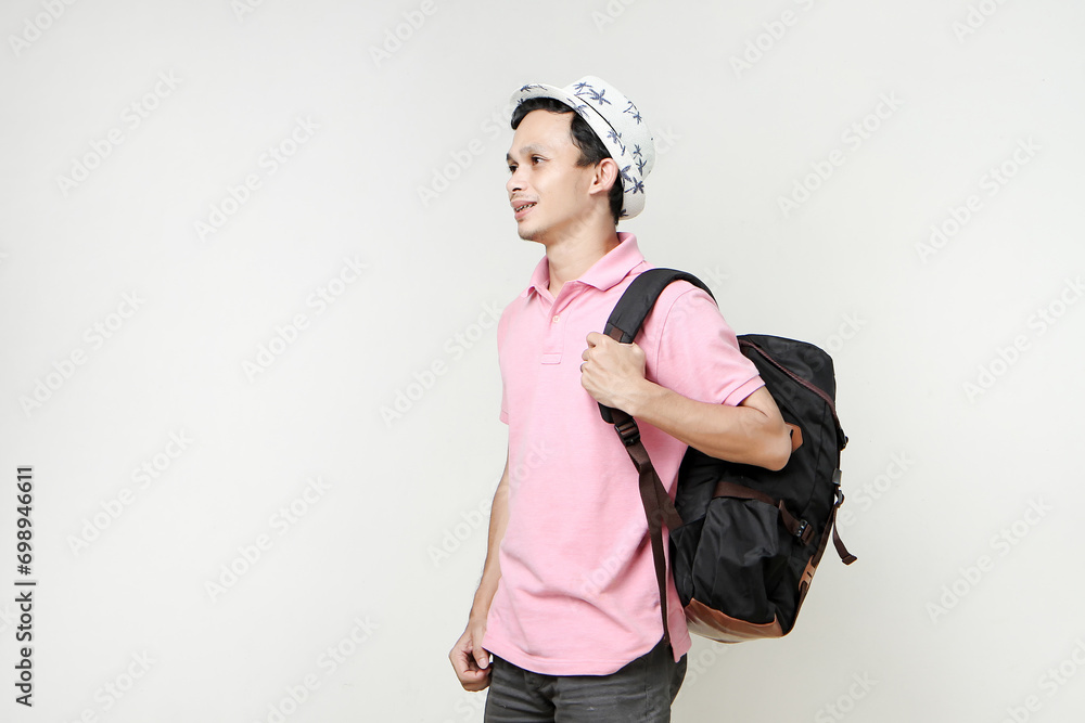 Asian man backpacker portrait. digital nomad and travelling concept. on isolated background Asian man backpacker portrait. digital nomad and travelling concept. on isolated background