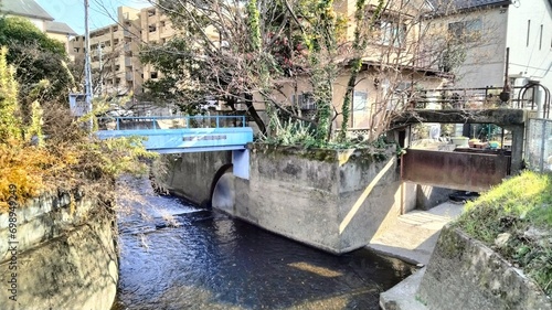 River in residential area, Kyoto, Japan