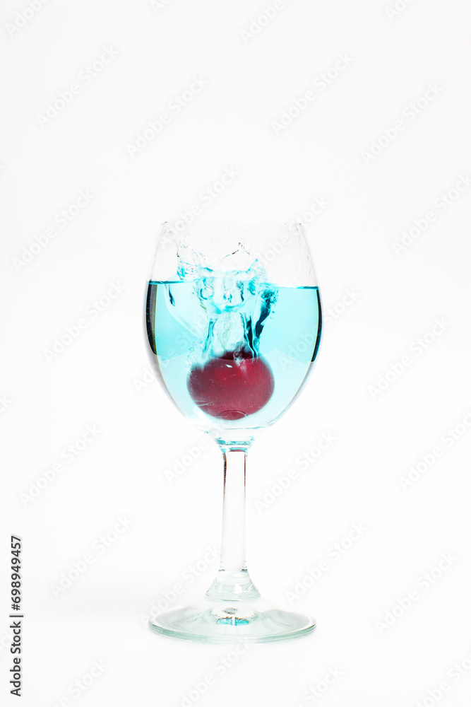 Glass with water on a white background Glass with water on a white background