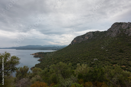 Stunning view to the sea from the hills around Toroni village, Chalkidiki, Greece, under a cloudy sky in autumn