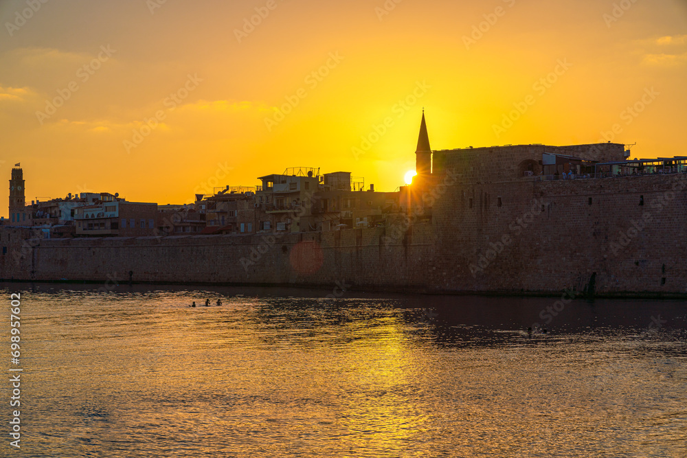 Scenic view of Acre, a historic city, in Israel, during the golden hour.