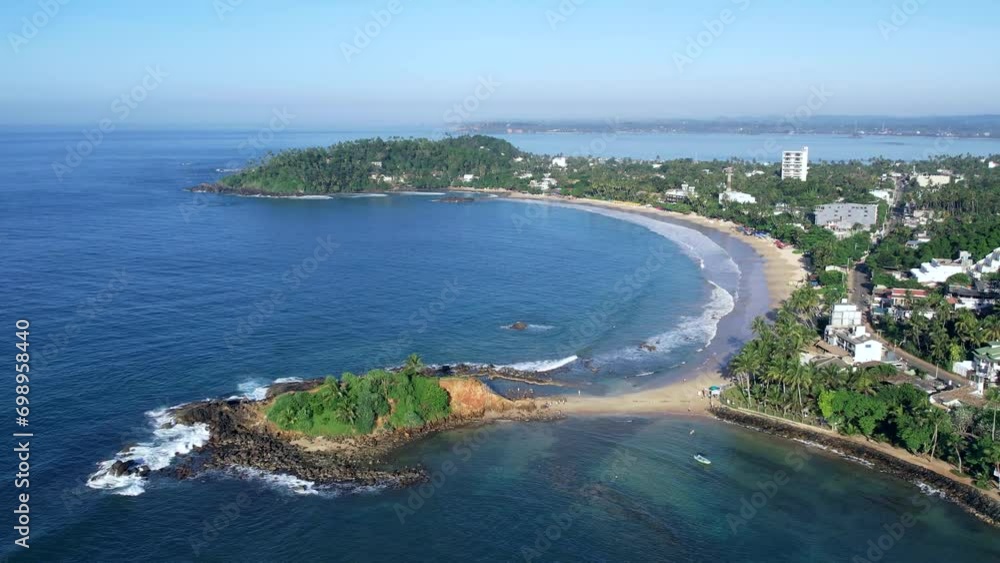 Beautiful Indian Ocean coastline on the island of Sri Lanka, Mirissa. Top view, aerial video filming. Beautiful Indian Ocean coastline on the island of Sri Lanka, Mirissa. Top view, aerial video filming.