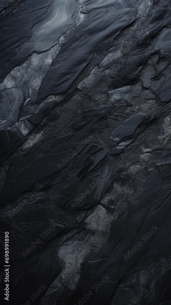 Black abstract background. Close-up image of the surface of the stone. Black abstract background. Close-up image of the surface of the stone.