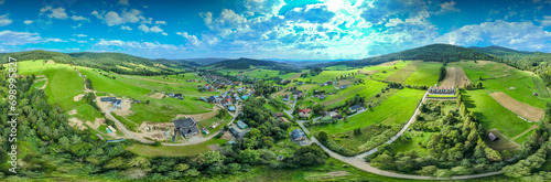Fototapeta Naklejka Na Ścianę i Meble -  Lot nad Jastrzębikiem latem. Piękna, letnia panorama.