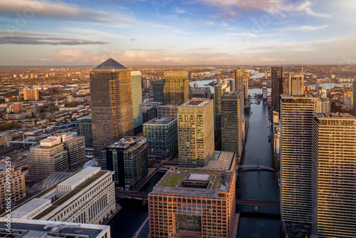 Panoramic view of the skyscrapers at the financial district Canary Wharf of London, England, during sunset time photo