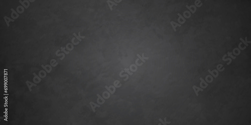 Dark black stone wall grunge backdrop texture background. monochrome slate grunge concrete wall black backdrop vintage marbled textured border background.   © armans