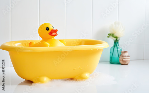 Yellow Rubber Duck in White Bathtub in the bathroom