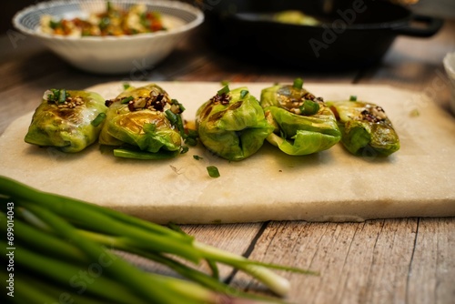 Cabbage and Dumplings, Cabbage Dumplings is Crispy, savory, meaty potstickers packed with a deliciously seasoned ground pork and cabbage with garlic and ginger. photo