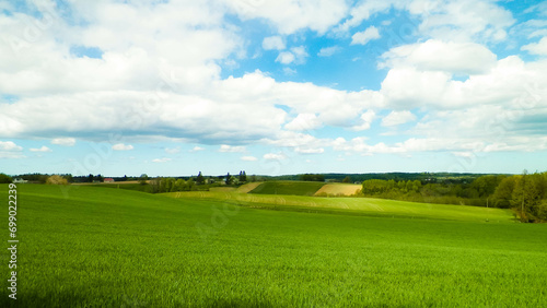 Green fields and hills in Wiezyca  Kashubian Region  Poland.