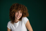beautiful smiling curly young woman