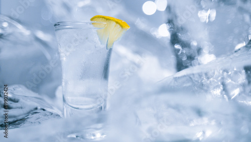A glass of vodka with ice and lemon © Stanislav Loginov