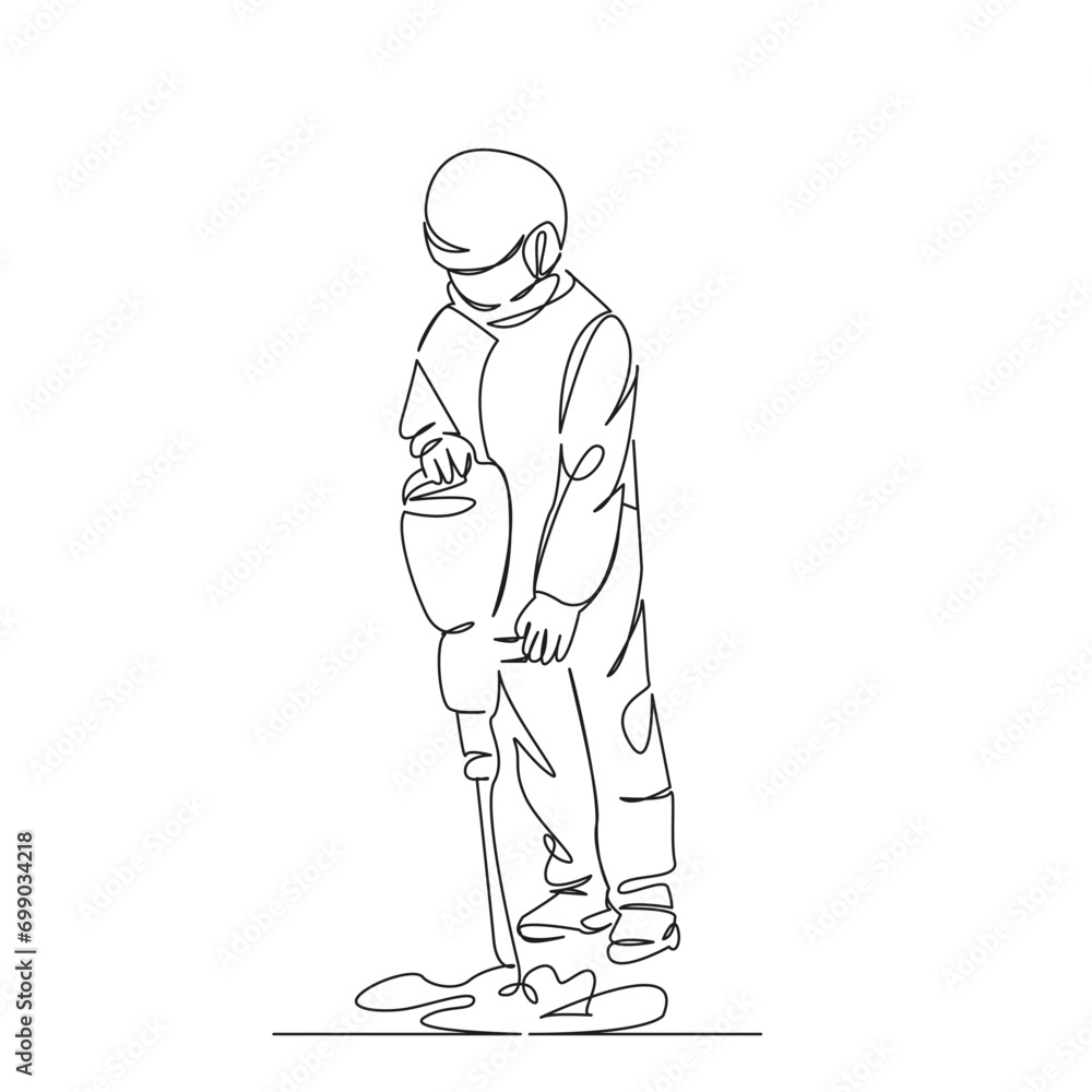 worker hammering with a hammer drill worker hammering with a hammer drill