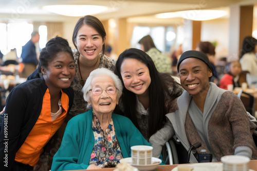 Diversity Among Residents And Staff Is Highlighted In Multiracial Nursing Home photo