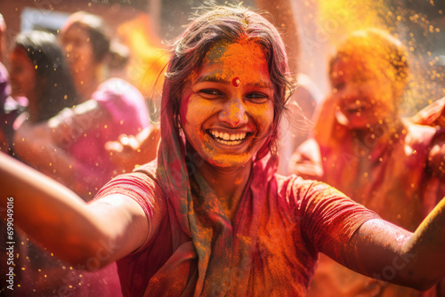 Indian Women In Traditional Sari Dress Celebrate Holi With Paint Throwing