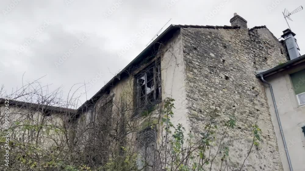 Decaying Elegance: Weathered Abandoned Building with Overgrown Vines and Vintage Antennas Decaying Elegance: Weathered Abandoned Building with Overgrown Vines and Vintage Antennas