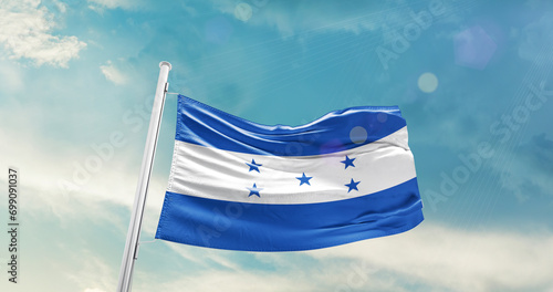 Honduras national flag cloth fabric waving on the sky - Image