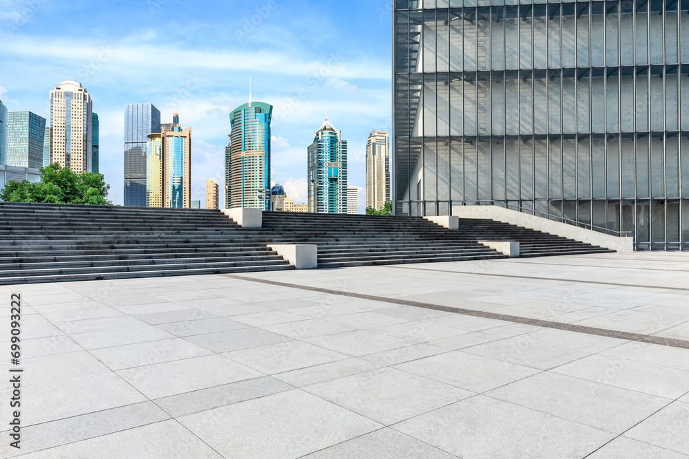 Fototapeta premium City square floor and modern commercial building scenery in Shanghai. Famous financial district buildings in Shanghai.
